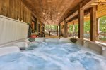 Enjoy Soaking In The Covered Hot Tub 